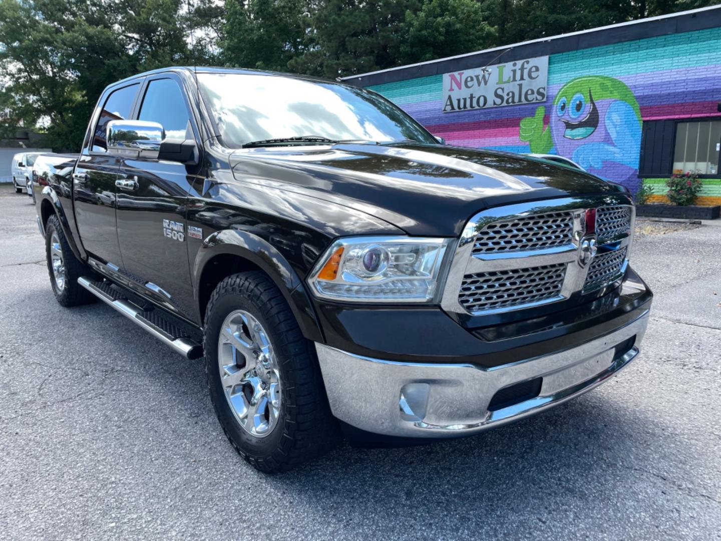 2013 BROWN RAM 1500 LARAMIE (1C6RR6NT8DS) with an 5.7L engine, Automatic transmission, located at 5103 Dorchester Rd., Charleston, SC, 29418-5607, (843) 767-1122, 36.245171, -115.228050 - Clean CarFax (no accidents reported!) Leather, Navigation, Backup Camera, CD/Sat/Bluetooth, Dual Climate Control, Power Everything (windows, locks, seats, mirrors), Heated/Cooled Seats, Heated Rear Seats, Heated Steering Wheel, Power Sliding Rear Window, Power Inverter, Push Button Start, Keyless E - Photo#0